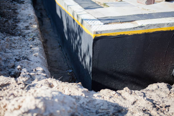 Professional Interior Drainage System technician working in Connersville, IN